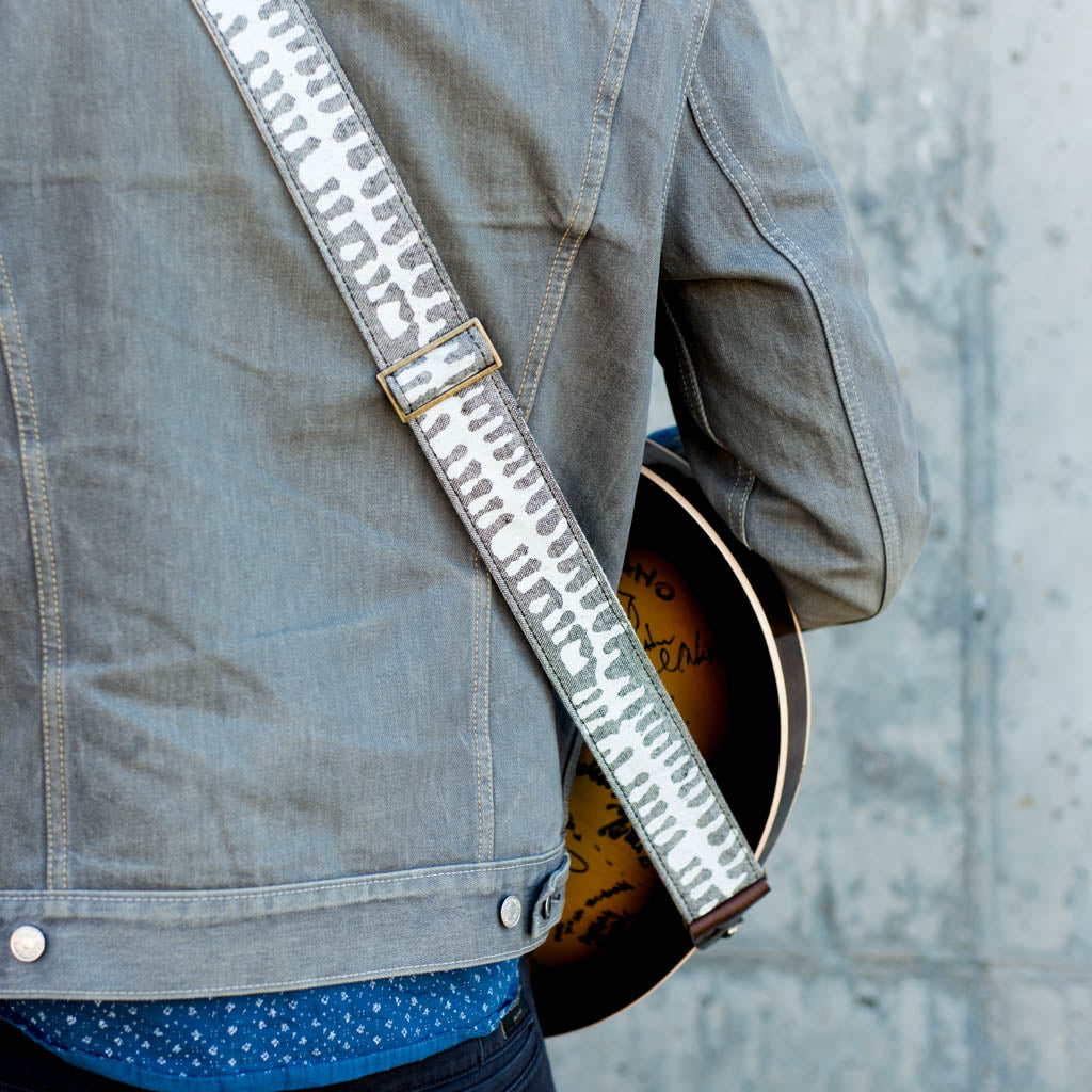 White and gray skeletal spine India block print vintage-style guitar strap by Original Fuzz.
