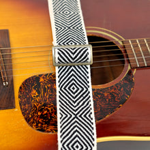 Black and white handwoven Peruvian guitar strap with a 1969 sunburst Gibson J-45