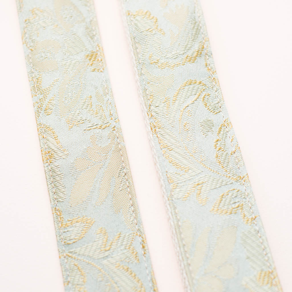 Light blue paisley embroidered vintage guitar strap by Original Fuzz.