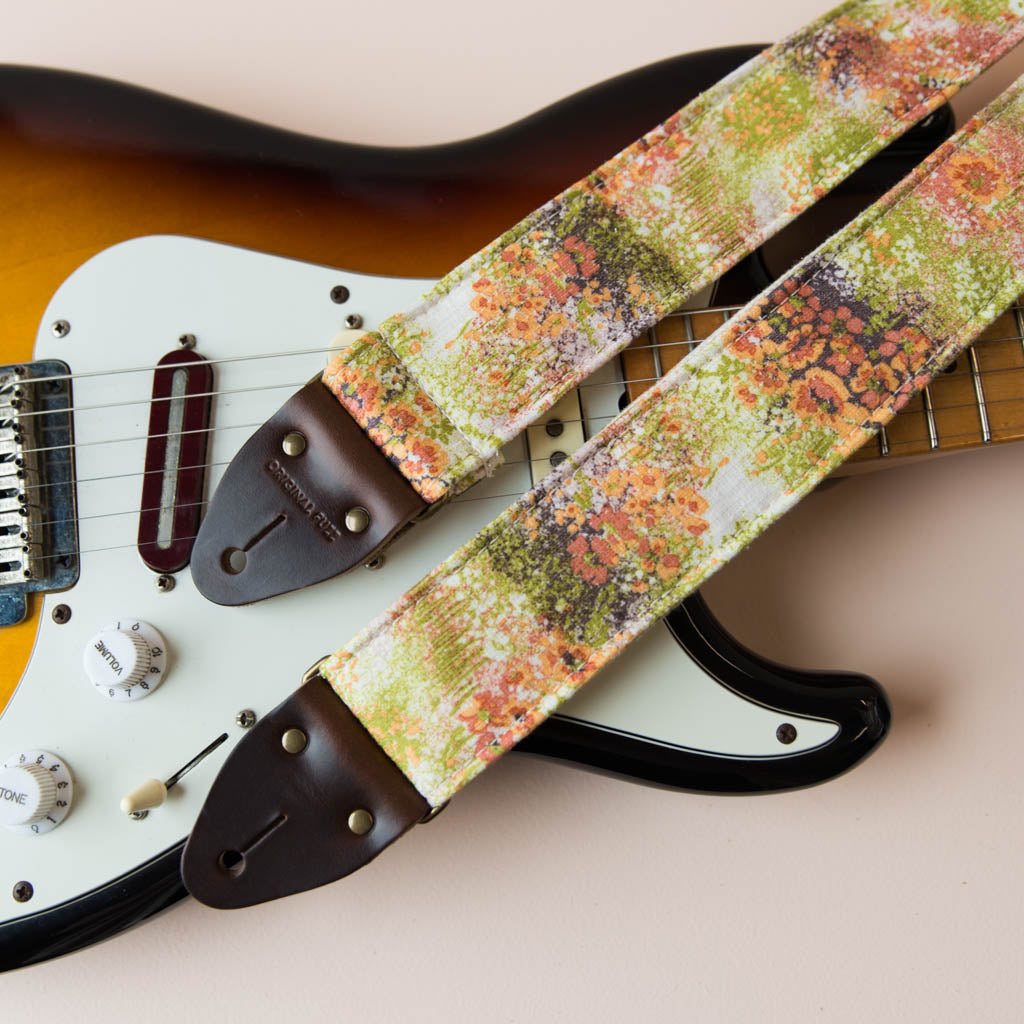 Vintage guitar strap made with 70s floral polyester by Original Fuzz.