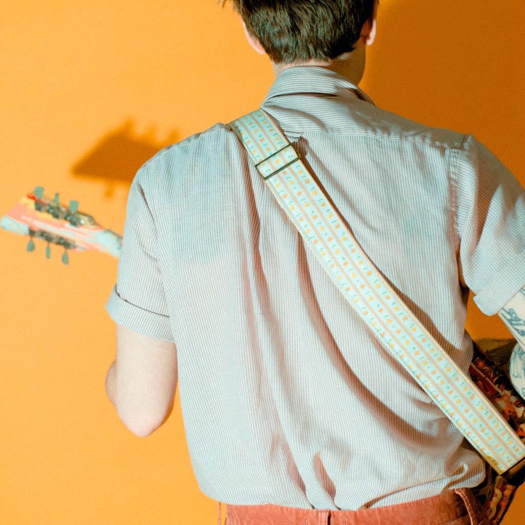 Vintage guitar strap with a yellow ditsy floral pattern by Original Fuzz.