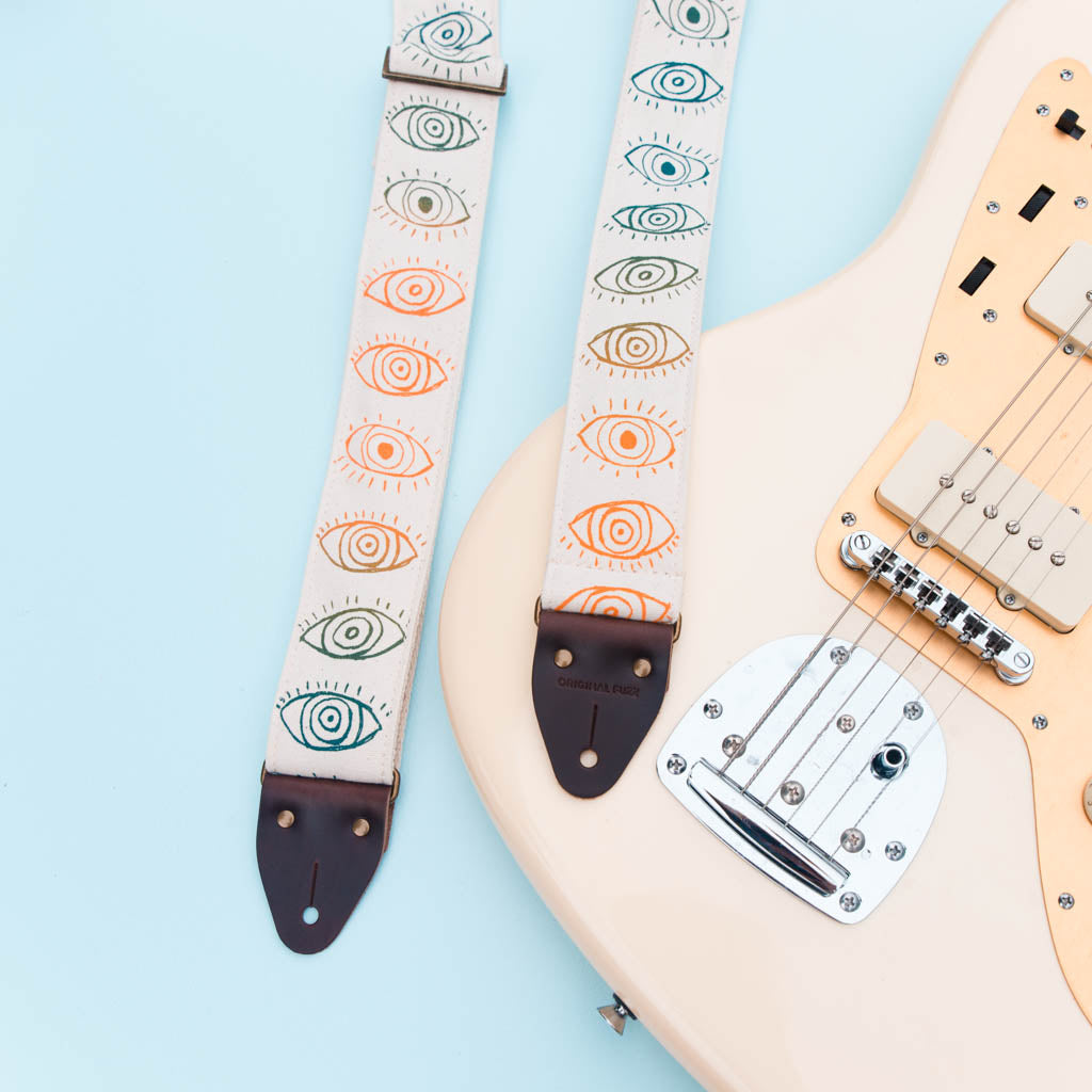 cyclops eyeball silkscreen guitar strap by original fuzz and grand palace