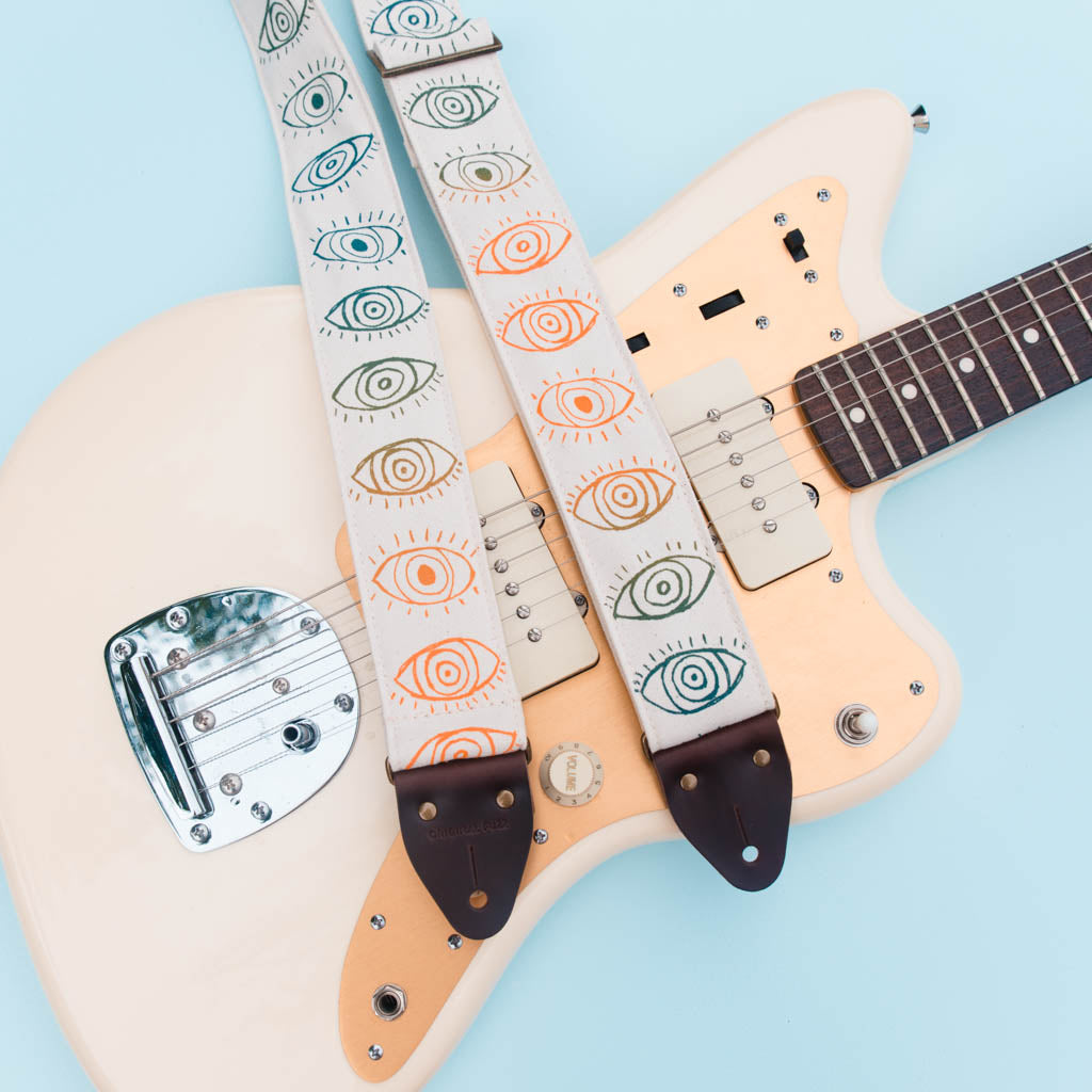 cyclops eyeball silkscreen guitar strap by original fuzz and grand palace
