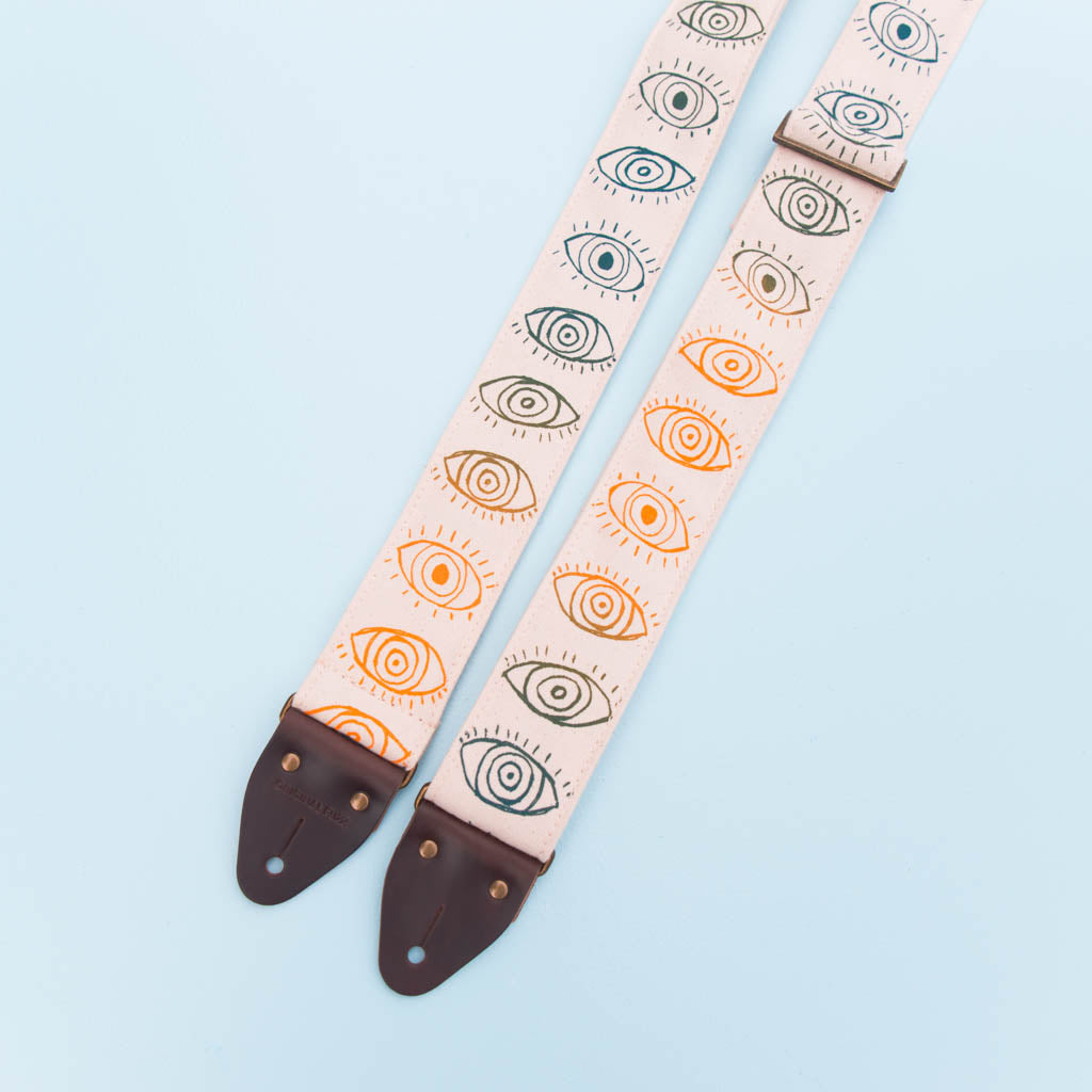 cyclops eyeball silkscreen guitar strap by original fuzz and grand palace