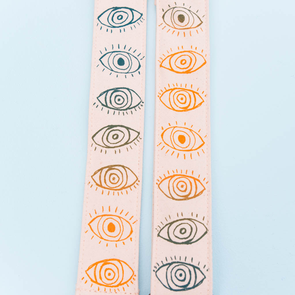 cyclops eyeball silkscreen guitar strap by original fuzz and grand palace
