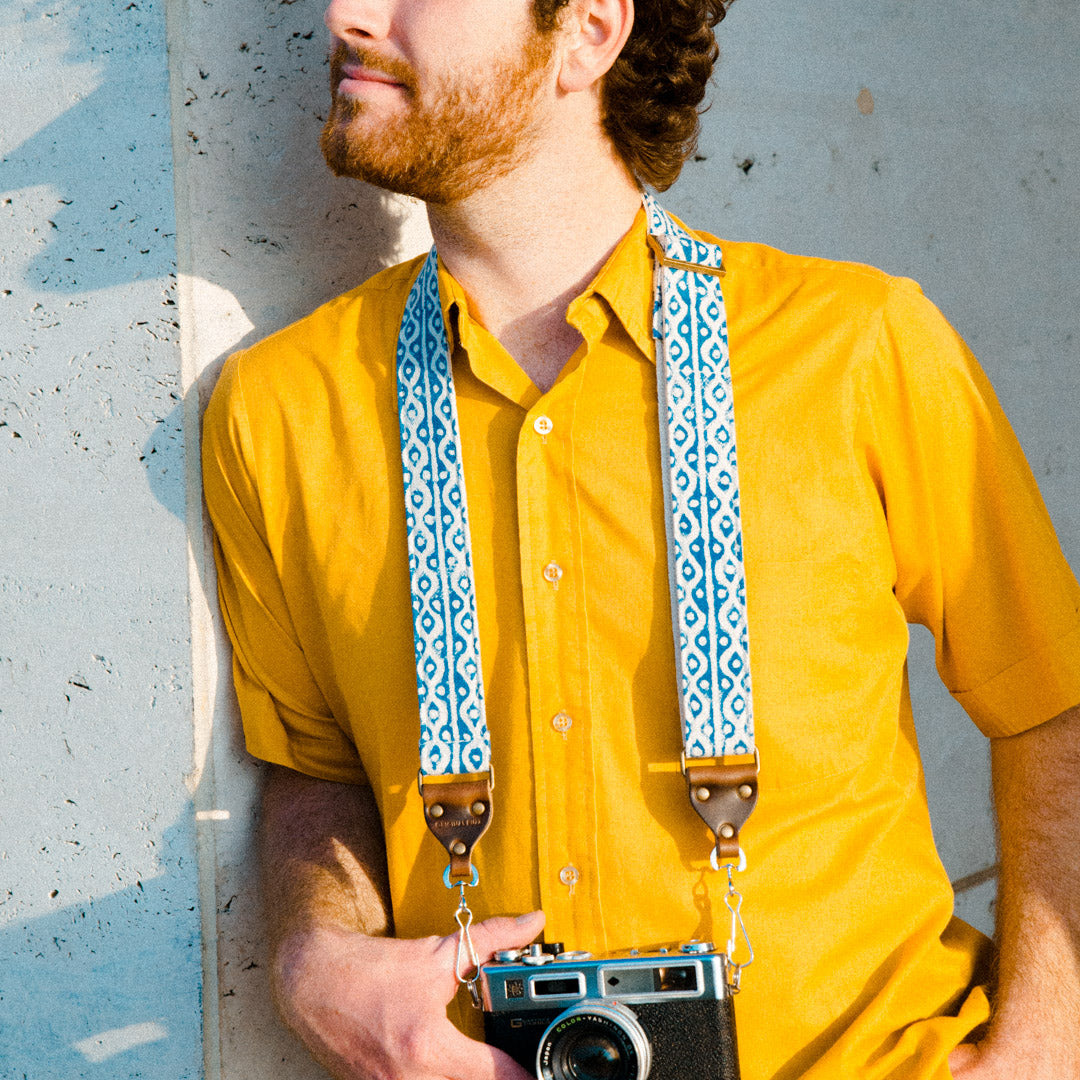 Blue and white block printed vintage-style camera strap made with fabric stamped in India by Original Fuzz in Nashville.