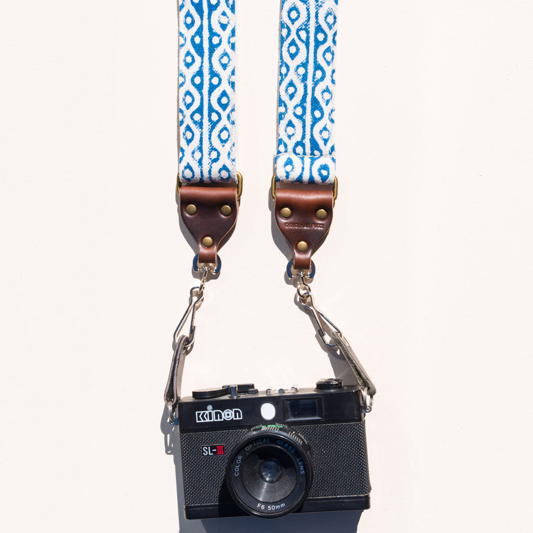 Blue and white block printed vintage-style camera strap made with fabric stamped in India by Original Fuzz in Nashville.
