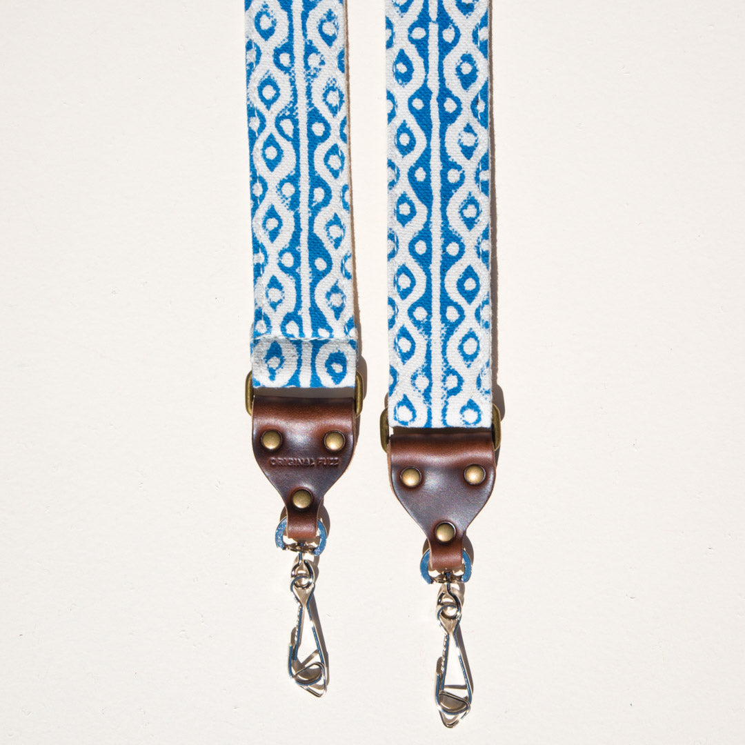 Blue and white block printed vintage-style camera strap made with fabric stamped in India by Original Fuzz in Nashville.