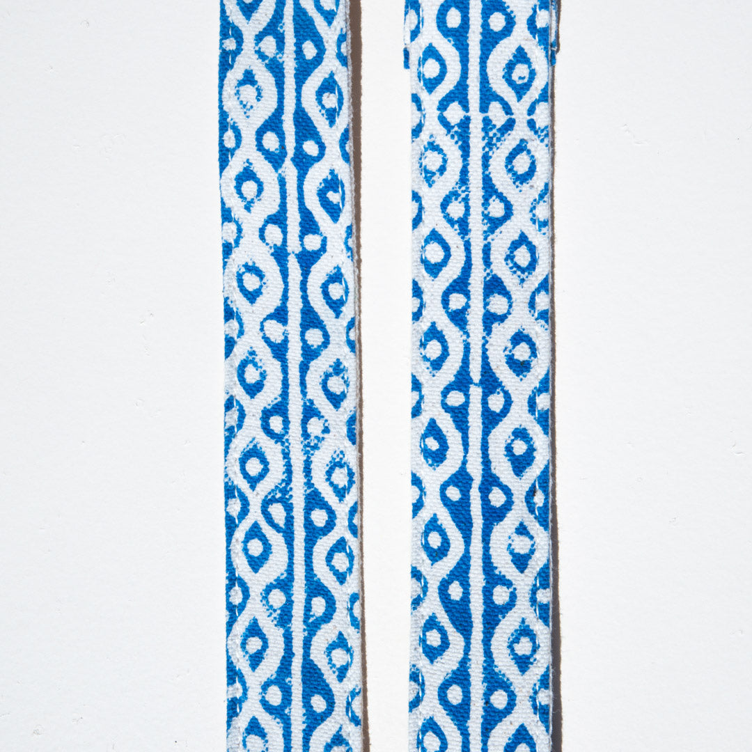 Blue and white block printed vintage-style camera strap made with fabric stamped in India by Original Fuzz in Nashville.