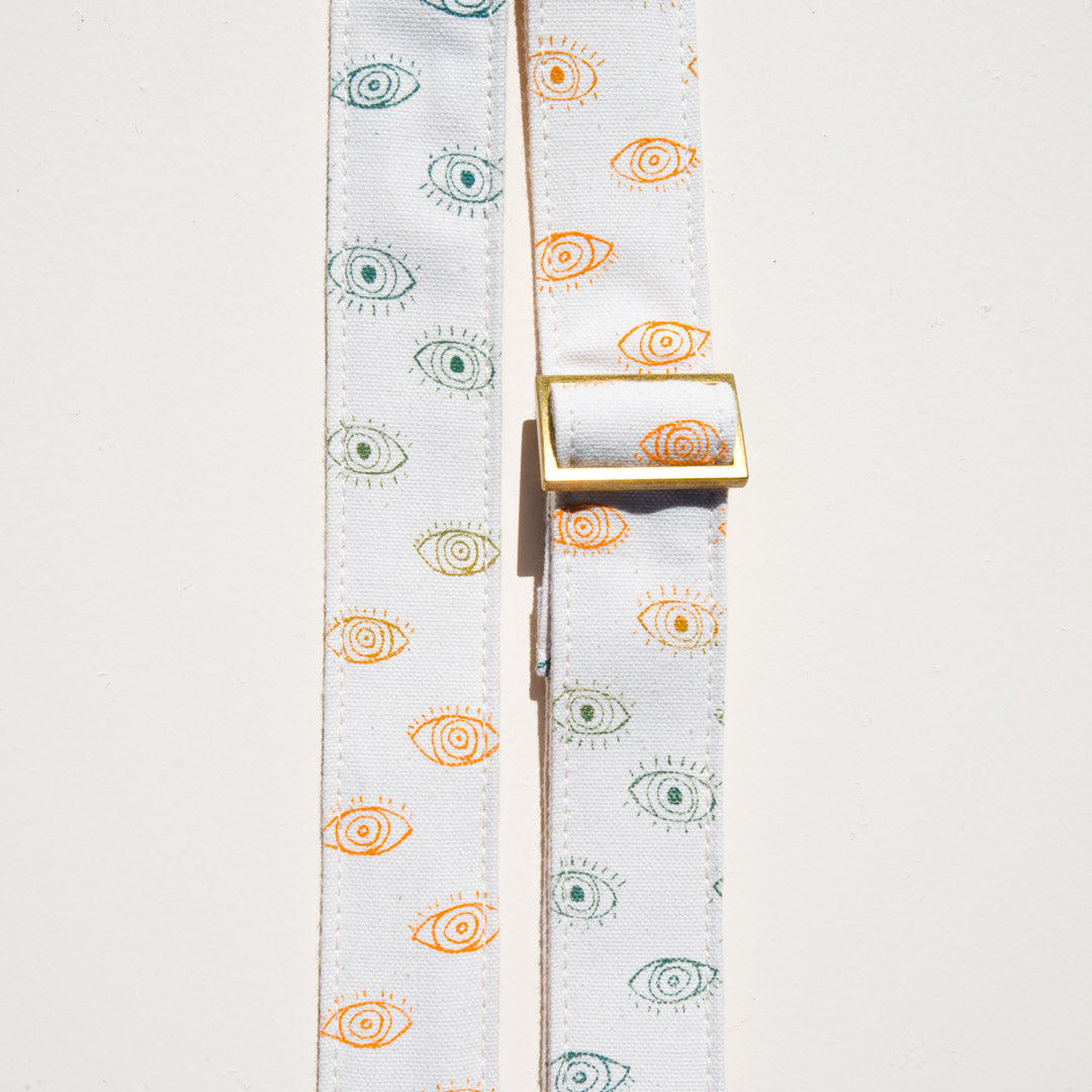 Eyeball silkscreened vintage-style skinny camera strap made by Original Fuzz in Nashville.