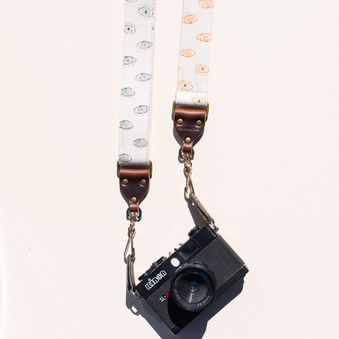 Eyeball silkscreened vintage-style skinny camera strap made by Original Fuzz in Nashville.