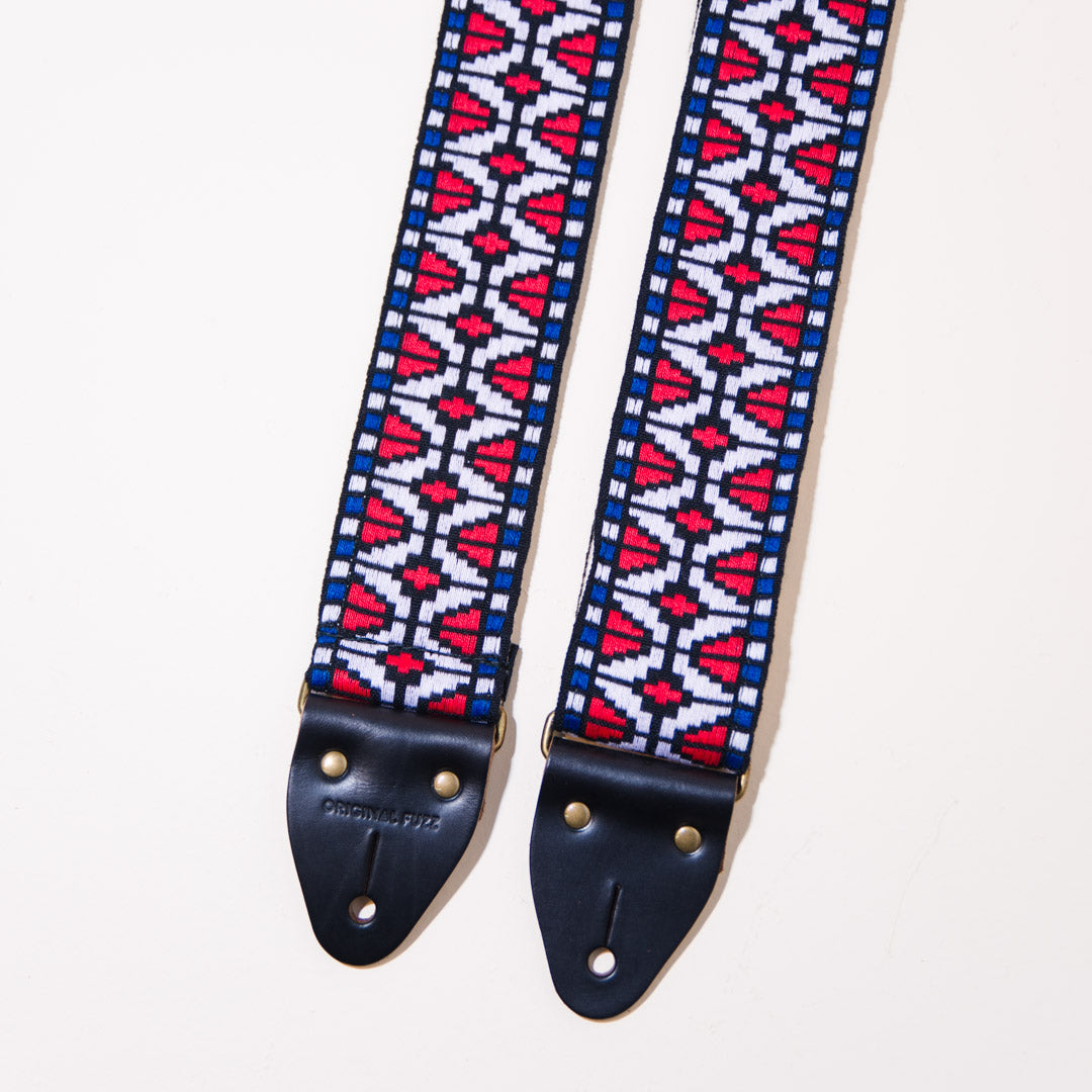 Close up of the vintage guitar strap in Patton Ave