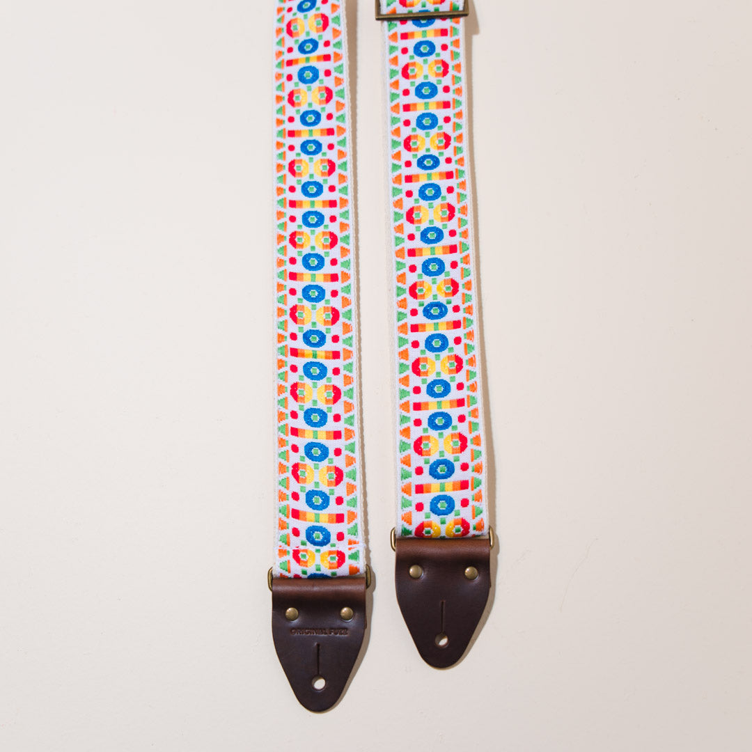 Close up of The Vintage Guitar Strap in Tabernacle Road featuring the brown horween leather