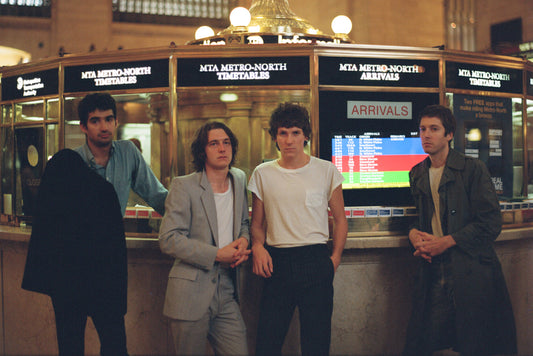 The band Public Access T.V. pose in Grand Central Station.