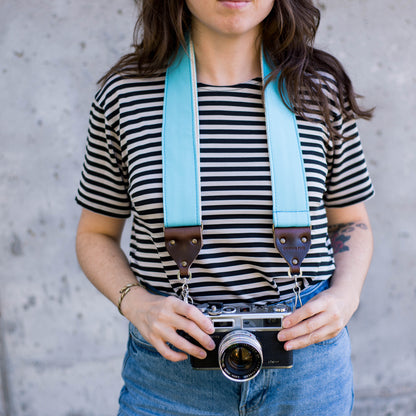 Light arctic blue vintage-style camera strap made by Original Fuzz in Nashville, TN.