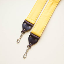 Yellow cotton canvas vintage-style camera strap with antique brass hardware made by Original Fuzz in Nashville, TN.