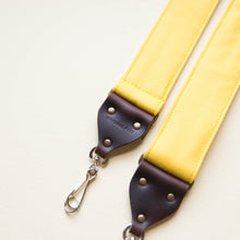Yellow cotton canvas vintage-style camera strap with antique brass hardware made by Original Fuzz in Nashville, TN.