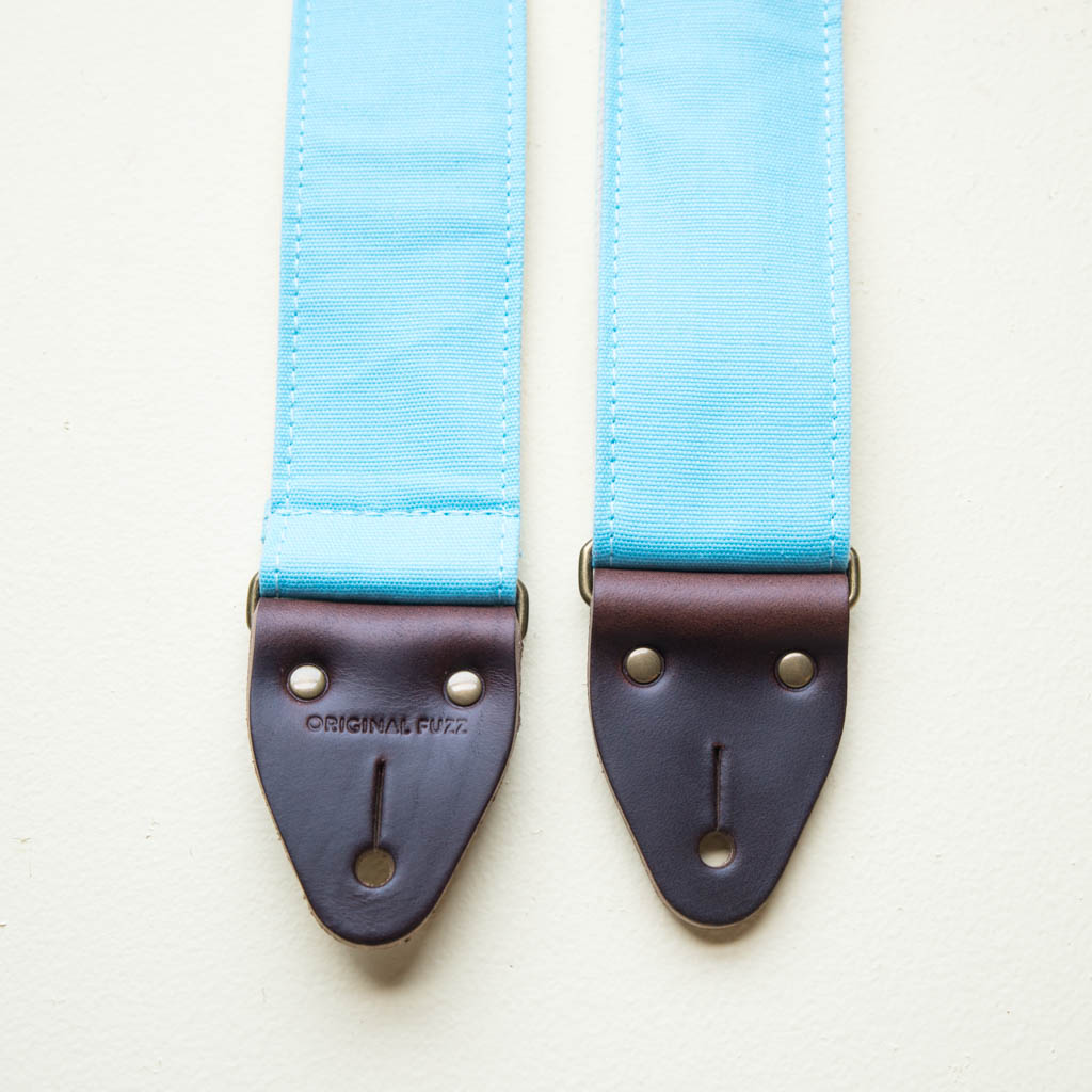 Light arctic blue cotton canvas vintage-style guitar strap made by Original Fuzz in Nashville. 