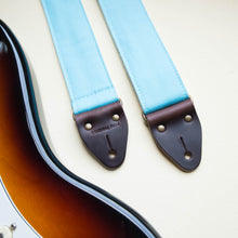 Light arctic blue cotton canvas vintage-style guitar strap made by Original Fuzz in Nashville, TN with a Fender Jazzmaster.