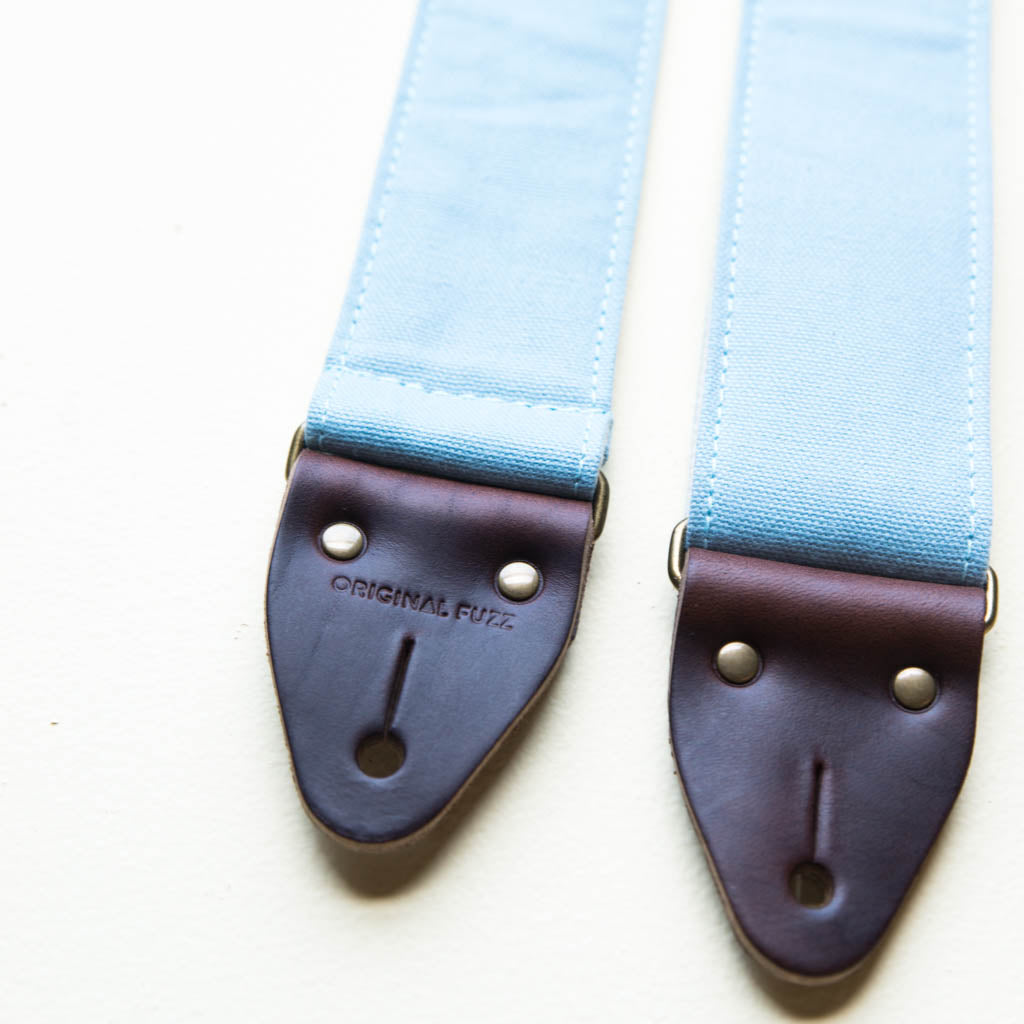 Light blue cotton canvas vintage-style guitar strap made by Original Fuzz in  Nashville, TN.