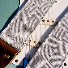 Woven black and cream guitar strap made with imported fair-trade fabric from Indian in Nashville by Original Fuzz.