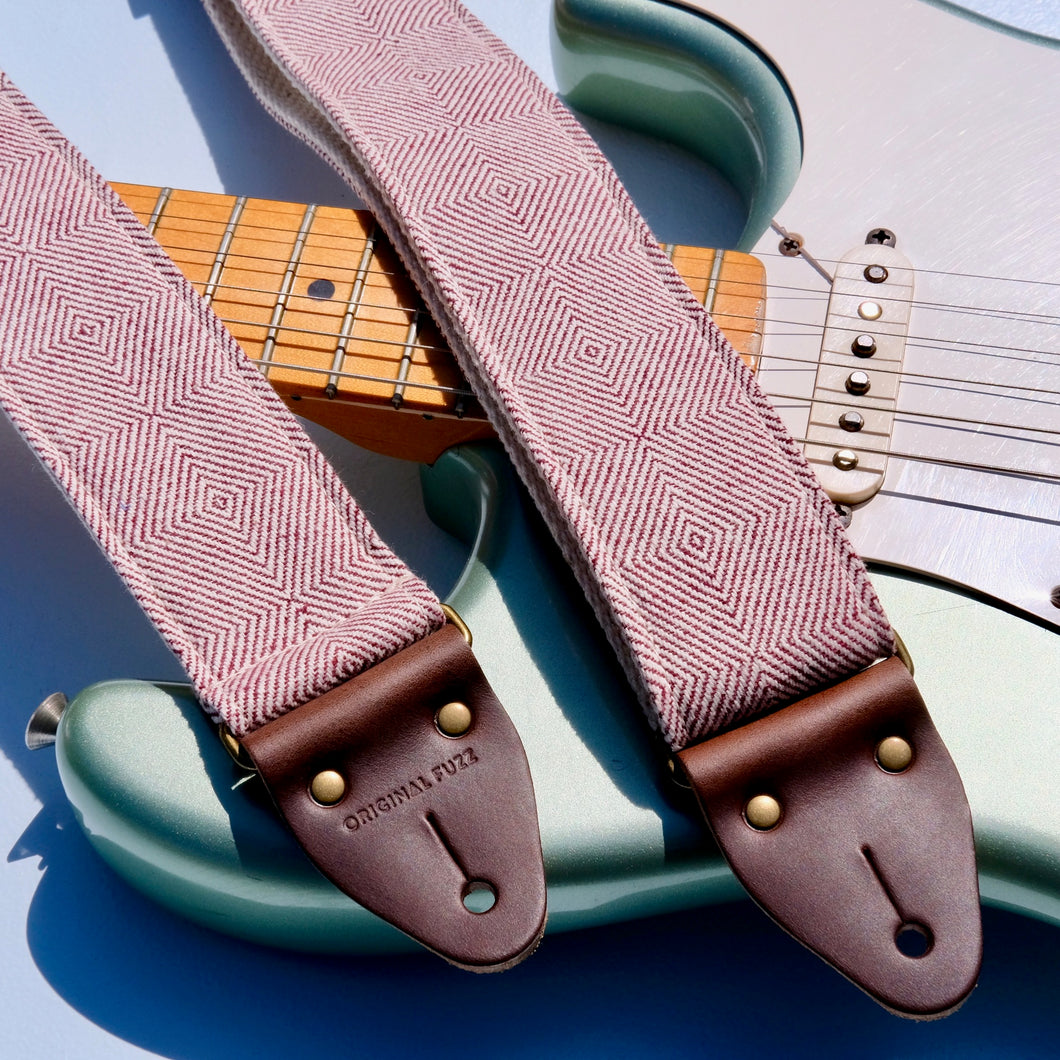 Red woven guitar strap made with fair-trade fabric from India by Original Fuzz in Nashville. 