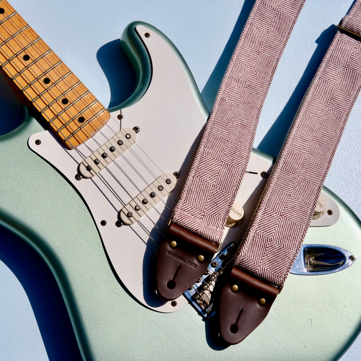 Red woven guitar strap made with fair-trade fabric from India by Original Fuzz in Nashville. 