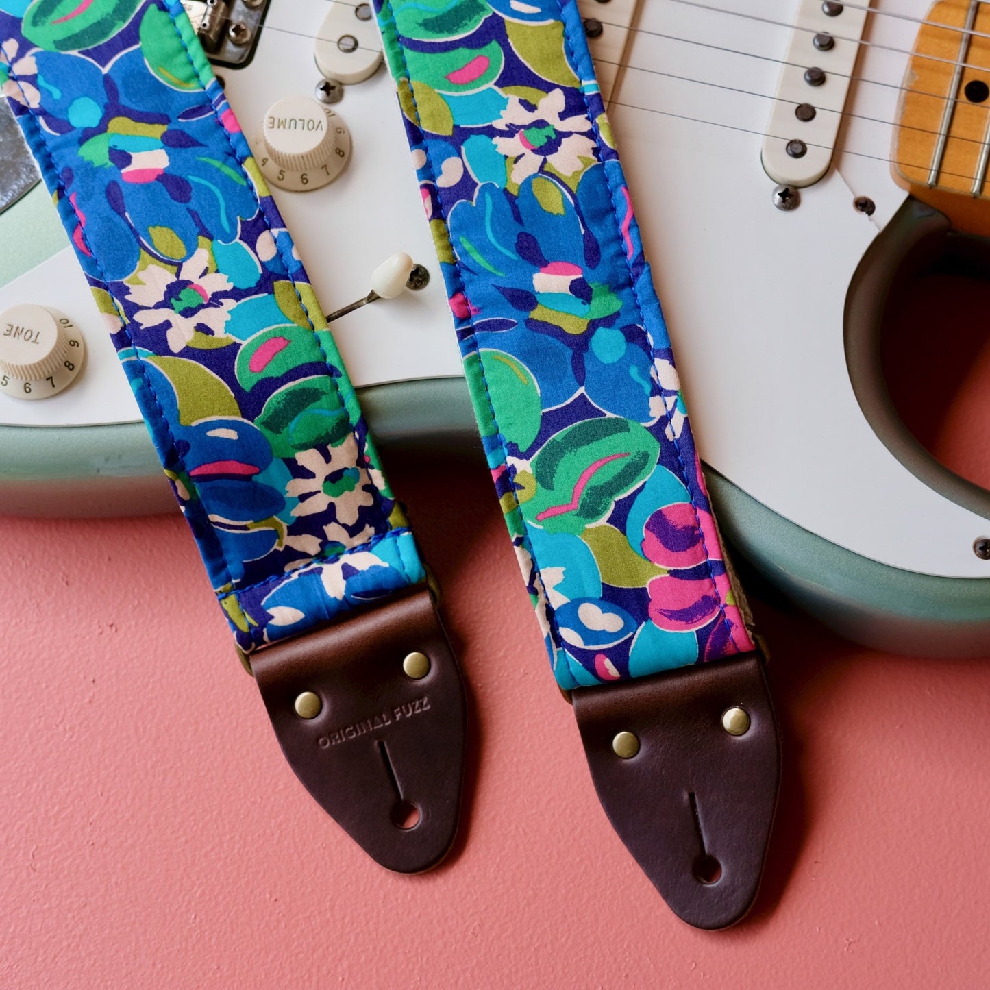 Blue floral silk guitar strap handmade in Nashville by Original Fuzz.