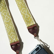 Vintage-style camera strap by Original Fuzz with Indian fabric.