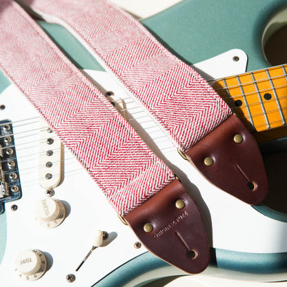 Red and cream herringbone woven cotton from India vintage-style guitar strap made by Original Fuzz with Fender Stratocaster.