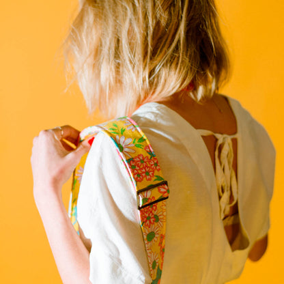 Original Fuzz vintage-style yellow floral camera strap.