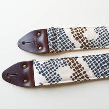 Vintage guitar strap made with repurposed 70s polyester with an abstract print by Original Fuzz.