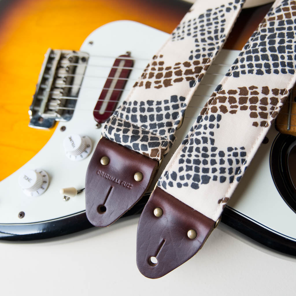 Vintage guitar strap made with repurposed 70s polyester with an abstract print by Original Fuzz.