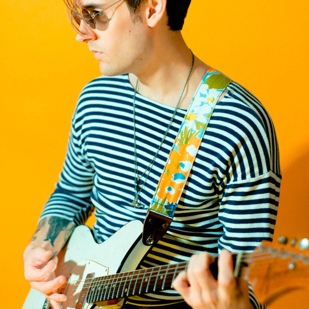 Floral guitar strap made with vintage fabric by Original Fuzz. 