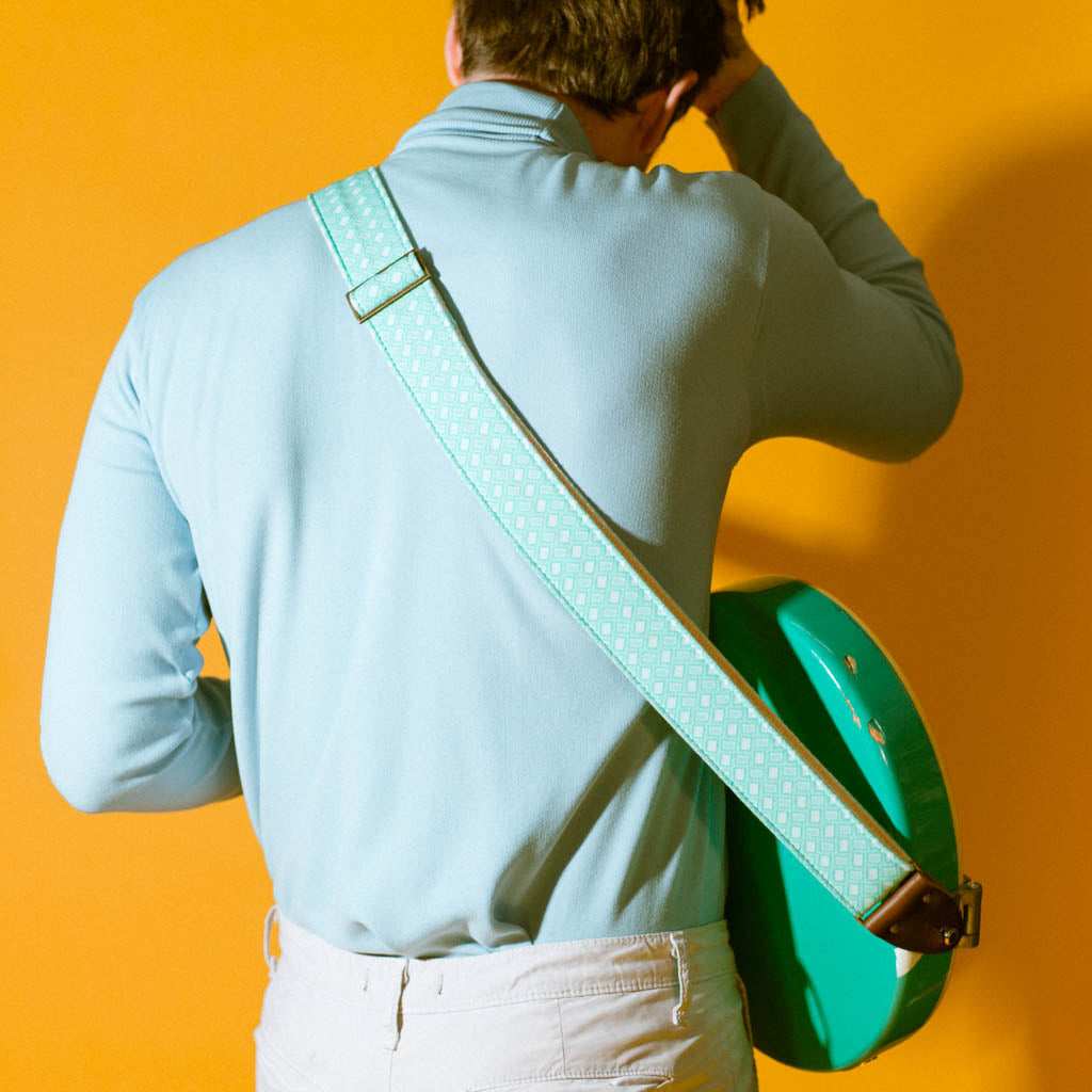 Vintage-style guitar strap made with repurposed surf green polyester with a diamond pattern by Original Fuzz.