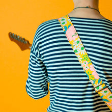 Original Fuzz vintage-style guitar strap made with repurposed yellow floral fabric.