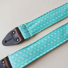 Vintage-style guitar strap made with repurposed surf green polyester with a diamond pattern by Original Fuzz.