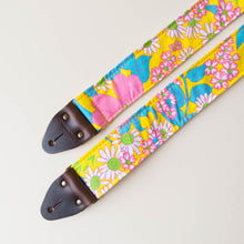 Original Fuzz vintage-style guitar strap made with repurposed yellow floral fabric.