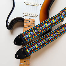 Vintage-style guitar strap made with a 60s style colorful woven jacquard by Original Fuzz.