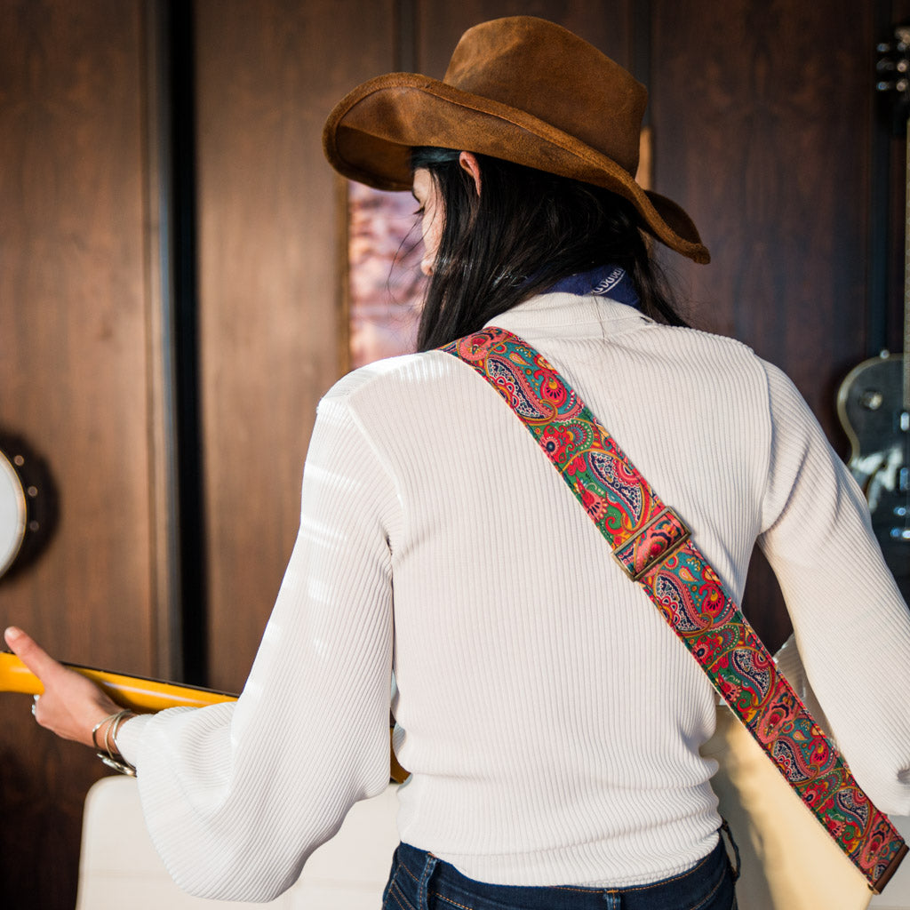 pink paisley guitar strap from the Nashville collection by Original Fuzz on model