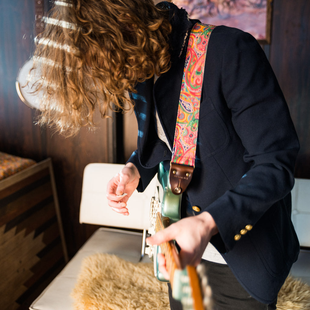 pink paisley guitar strap from the Nashville collection by Original Fuzz on model