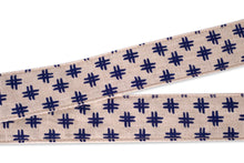 Close-up of the fabric in of our Nashville guitar strap in white and blue hashtag woven fabric we call the "Edgefield"