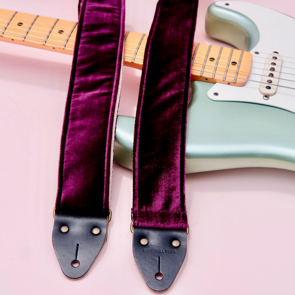 Original Fuzz purple velvet guitar strap with a Fender guitar. 