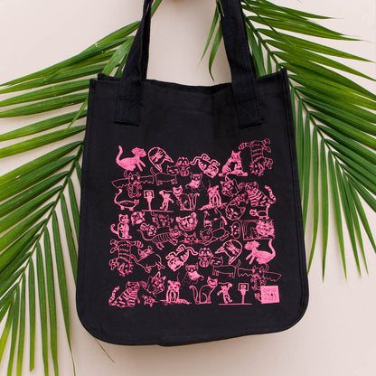 Original Fuzz black organic cotton tote bag silkscreened with hot pink Fuzz Fest cats is meant for carrying around records, groceries, whatever else you need to carry. 