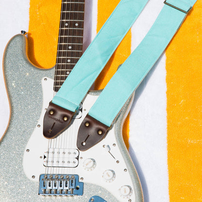 Vintage surf green polyester guitar strap made by Original Fuzz in Nashville, TN. 