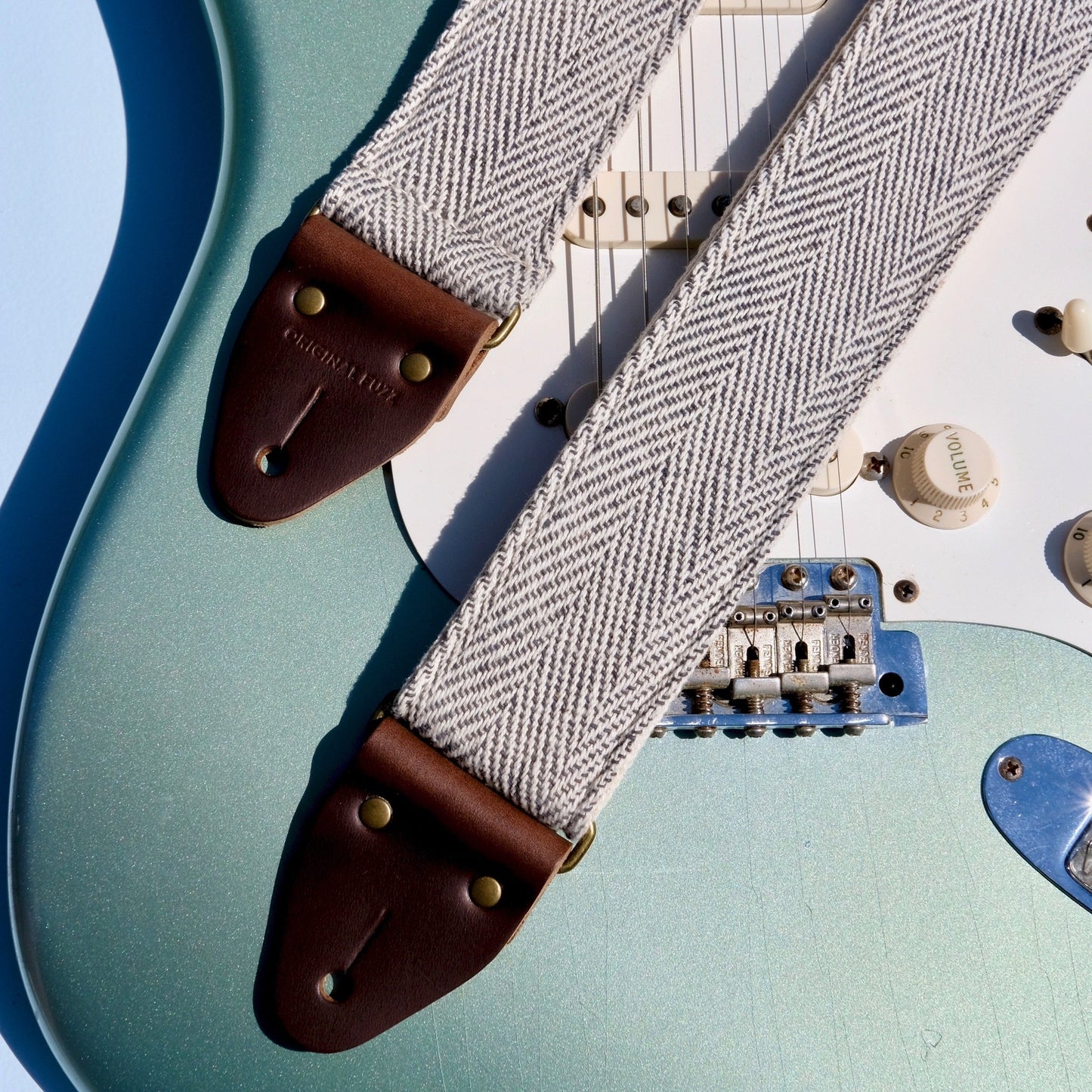 Black and cream woven guitar strap made in Nashville using fair-trade fabric from India.