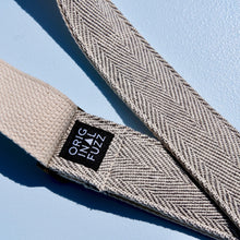 Black and cream woven guitar strap made in Nashville using fair-trade fabric from India.