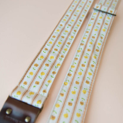 Vintage guitar strap with a yellow ditsy floral pattern by Original Fuzz.