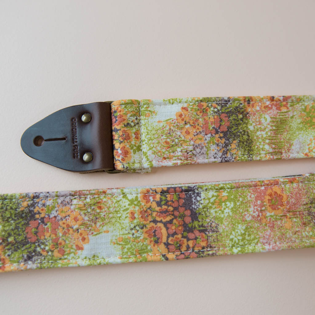 Vintage guitar strap made with 70s floral polyester by Original Fuzz. 