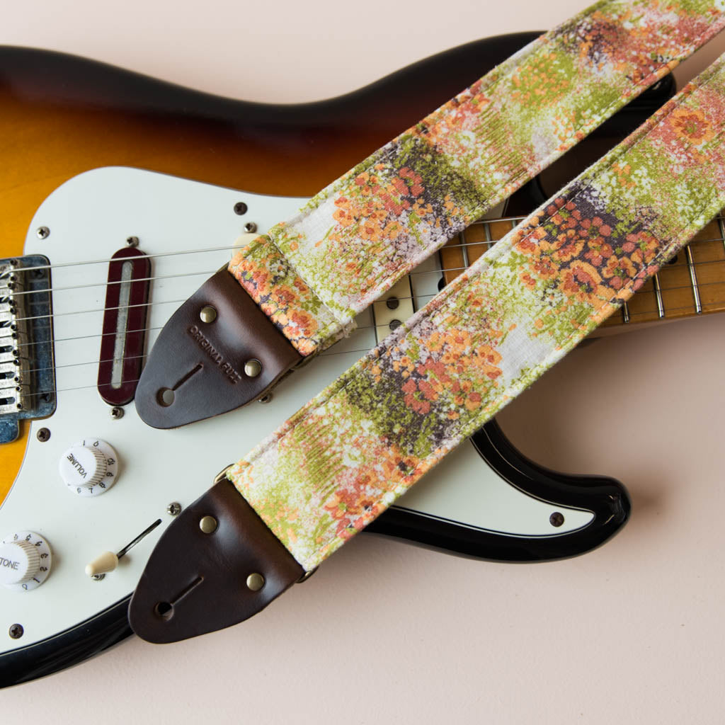 Vintage guitar strap made with 70s floral polyester by Original Fuzz. 